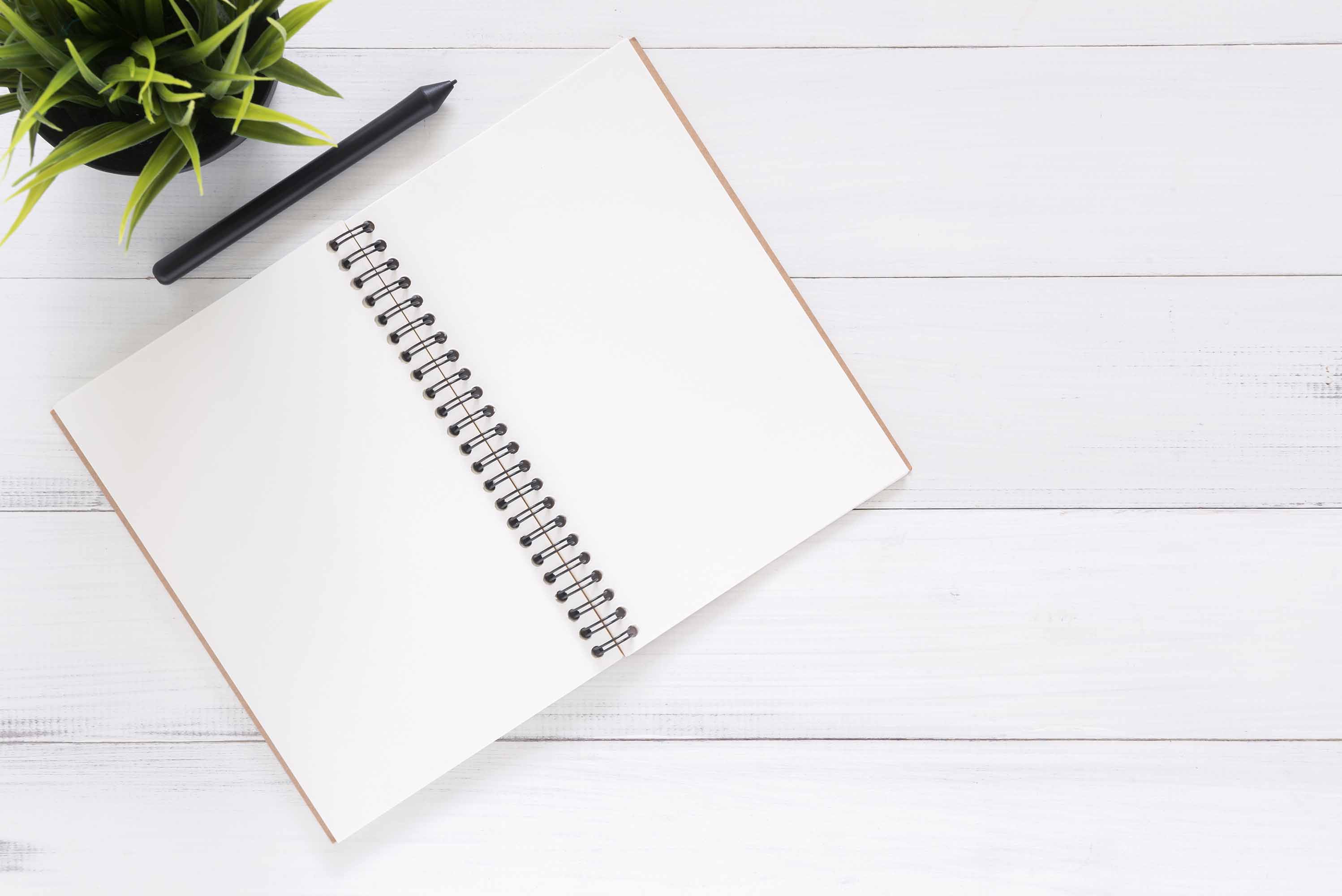 a notebook with a pencil